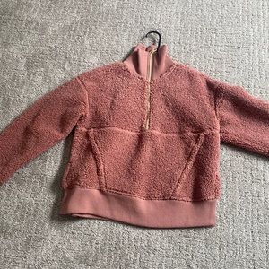 A super cute pink and gold size up sweater! This is so cute!